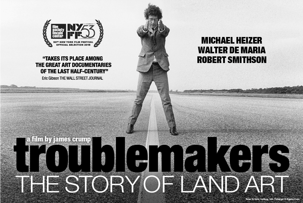 man standing in the middle of a road with hands in front outstretched "Troublemakers" the story of land art - movie poster