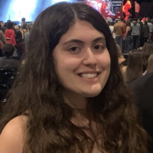 maeleigh, a high school student smiling at a concert