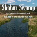 Poster for 'Shaker Swamp: Four Seasons in the Medicinal Wetlands of New Lebanon, New York' featuring a waterway and grassy banks.